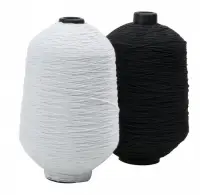 Two spools of elastic string and thread in white and black