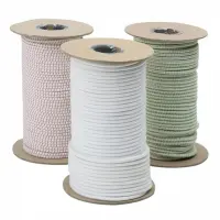 Three rolls of braided elastic cord in white, pink, and light green